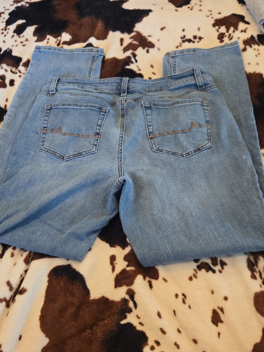 Light Blue Denim Jeans - Back Pocket Detail